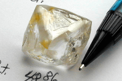 Picture of measuring raw cut diamond