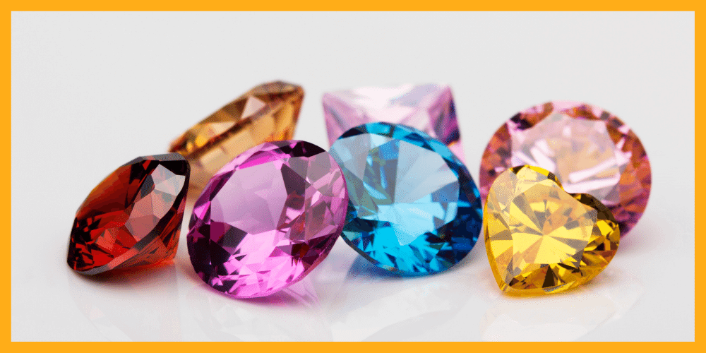 Assortment of fancy coloured gems and diamonds - cover image for JDMIS Gemmology
