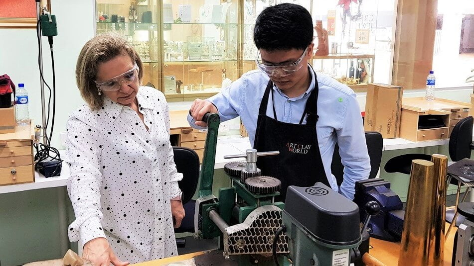 Student practice metalsmithing