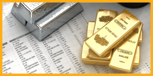 Picture of gold and silver bars putting next to a price sheet