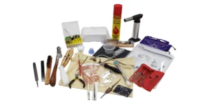 Picture of various metalsmithing 100 tools and materials for students to learn jewellery making