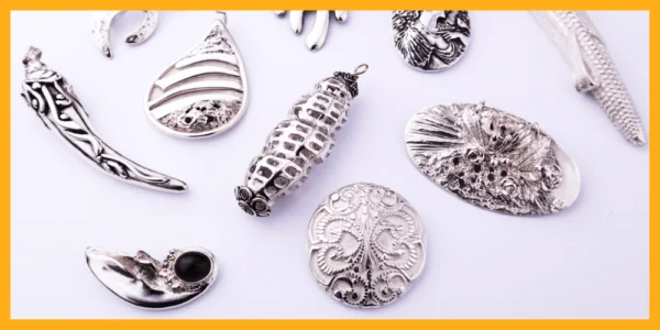 Picture of several intricate jewellery made from silver clay